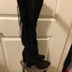 Thigh high tie boots